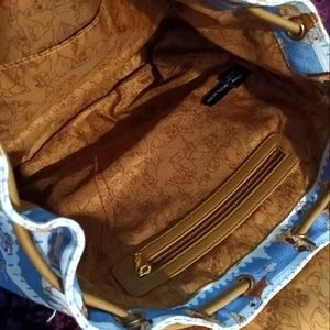 Loungefly Lady and the tramp fence rucksack